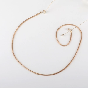 Elegant gold snake bone glasses chain with transparent non-slip rubber loop ends