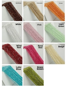 Close-up of sparkling sequin tassel curtains in 11 colors including champagne and burgundy