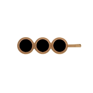 Vintage gold alloy hair clip with three geometric black enamel circles on white background