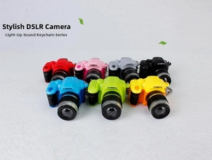 Miniature SLR camera keychains with LED light and sound effects in seven vibrant colors