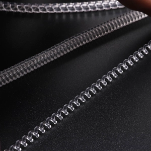 Clear spiral ring size adjuster for loose rings made of flexible TPU material