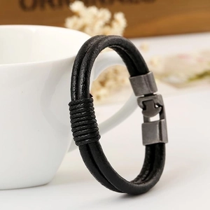 Vintage woven black leather bracelet for men featuring a retro metal interlocking clasp