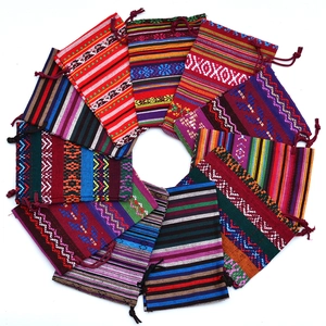 Ethnic cotton drawstring pouches with colorful woven patterns for gift packaging