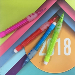Close-up of mini transparent mechanical pencils in pink, red, blue, and green jelly colors