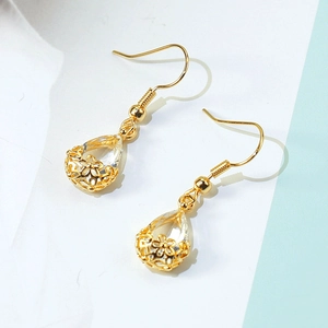 French style gold teardrop crystal earrings with hollow floral filigree design