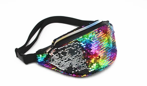 Detail of reversible rainbow sequins and black adjustable strap on women's waist bag