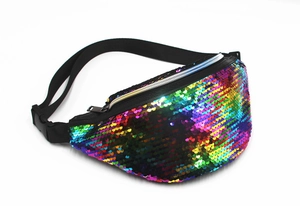 Detailed macro view of vibrant rainbow sequins and silver zipper on the waist bag
