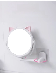 Detail of wall-mounted cat-ear makeup mirror with flexible rotating arm and adjustable bracket