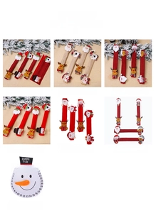 Detailed view of Christmas themed linen and velvet handle covers with Santa and deer motifs