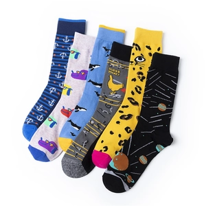 Detail view of 6-pair cotton crew socks set featuring assorted cartoon and novelty patterns