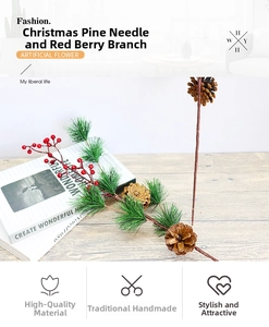 Close-up of artificial pine needles with red berries and natural pine cones for Christmas decor
