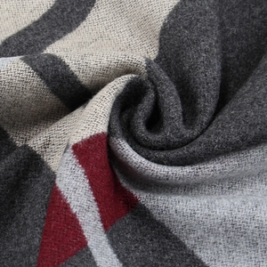 Fashionable men's winter knitted scarf with colorful stripes and soft thick texture