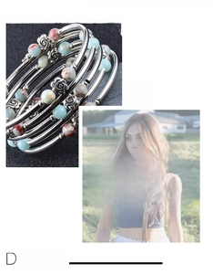 Macro detail of four-layer multi-wrap beaded bracelet with floral alloy charms