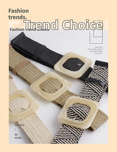 Detail of four stylish woven belts in black, khaki, beige and herringbone patterns