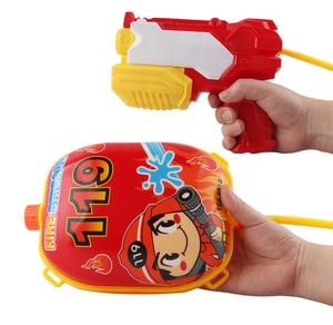 Close-up of red fire fighter backpack water gun for kids with hose connection