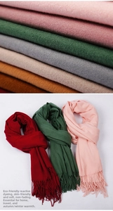 Macro detail of soft cashmere-feel scarf texture with fringe and eco-friendly dyeing