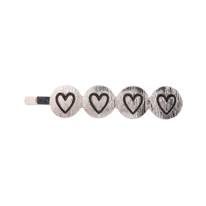 Silver brushed alloy hair clip featuring four interconnected hollow heart circles