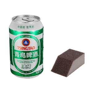 Brown emery sponge brush for kitchen rust removal and cleaning beside a 330ml soda can