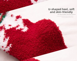 Close-up of U-shaped heel on thick coral fleece Christmas socks with soft texture