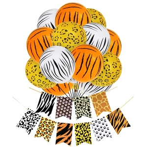 Detail of wild animal print party banner and balloons with tiger and leopard patterns