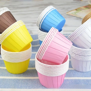Close-up of colorful greaseproof muffin liners with thickened rolled edges for baking