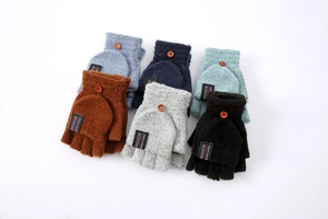 Detail of multi-color knitted convertible gloves featuring wooden buttons and labels