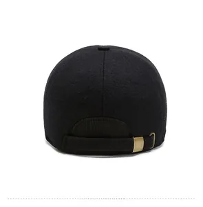Detail view of the black wool baseball cap back with adjustable metal buckle strap
