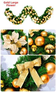 Detail of golden ornaments, ribbons and hollow flowers on green Christmas garland