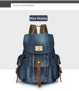 Dettaglio dello zaino vintage in denim con spallacci in pelle e chiusura con fibbia in metallo
