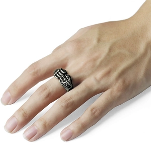 Vintage silver double fist clenched open ring with a punk style for men on white background