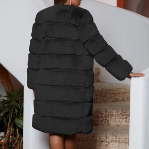 Rear view of a stylish long black faux fur coat for women with knee-length silhouette
