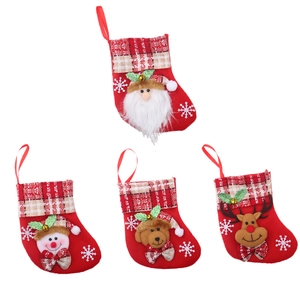 Set of 4 Christmas stockings with Santa, Snowman, Bear, and Reindeer patterns on white back
