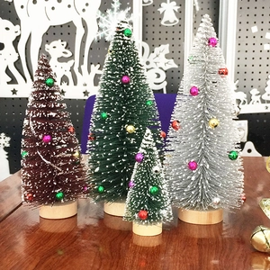 Mini cedar Christmas trees in brown, green, and silver with snow and wooden bases