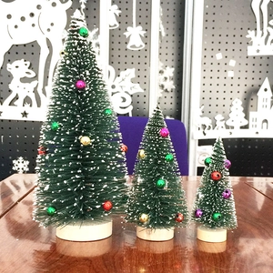 Three sizes of green mini cedar Christmas trees with snow effect and colorful ornaments