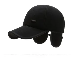 Detail view of winter baseball cap for men featuring wool fabric and foldable ear flaps