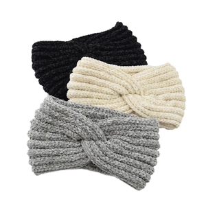 Three-pack knitted twist cross headbands in black, cream, and grey cozy winter warmers
