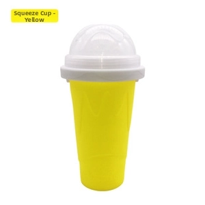 Detailed view of yellow silicone slushie maker cup with transparent lid and white ring