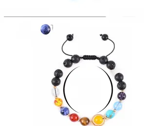 Detailed macro view of 8mm natural stone solar system bracelet with adjustable cord
