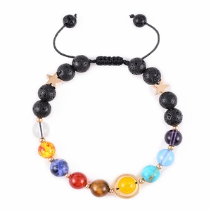 Detail of 8mm Solar System bracelet featuring natural lava stone and cosmic planet beads