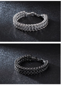 Detail view of double-row V-shaped woven stainless steel men's bracelet with lobster clasp