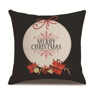 Detail of Christmas pillowcase with Merry Christmas text and festive holiday motifs