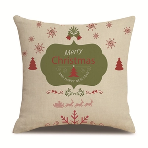 Close-up of linen Christmas pillowcase featuring Merry Christmas print and festive icons