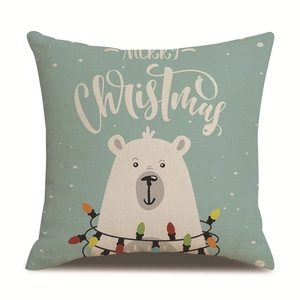 Teal linen Christmas pillowcase with Merry Christmas text and white snowflakes