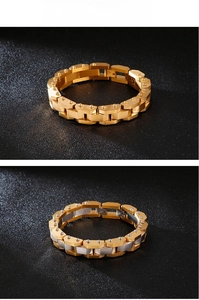 Detailed view of heavy stainless steel bracelets with rivet texture and dual-tone finish