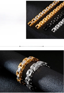 Macro shot of industrial style stainless steel watchband bracelets in gold silver and black