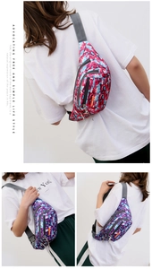 Detail of waterproof camouflage nylon waist bags showing adjustable straps and zippers