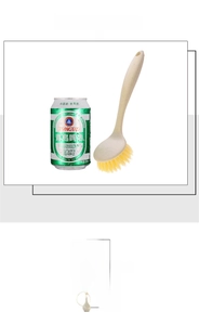 Detailed view of long-handled kitchen brush next to a can for size comparison