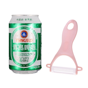 Pink ceramic blade peeler for fruit and vegetables with ergonomic handle and hole design