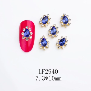 Detailed view of 7.3x10mm drop-shaped blue crystal nail art charms with micro-inlaid diamonds