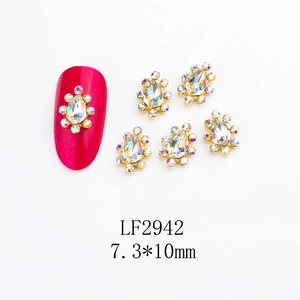 Detail of alloy nail art jewels LF2942 with golden base and AB iridescent rhinestones